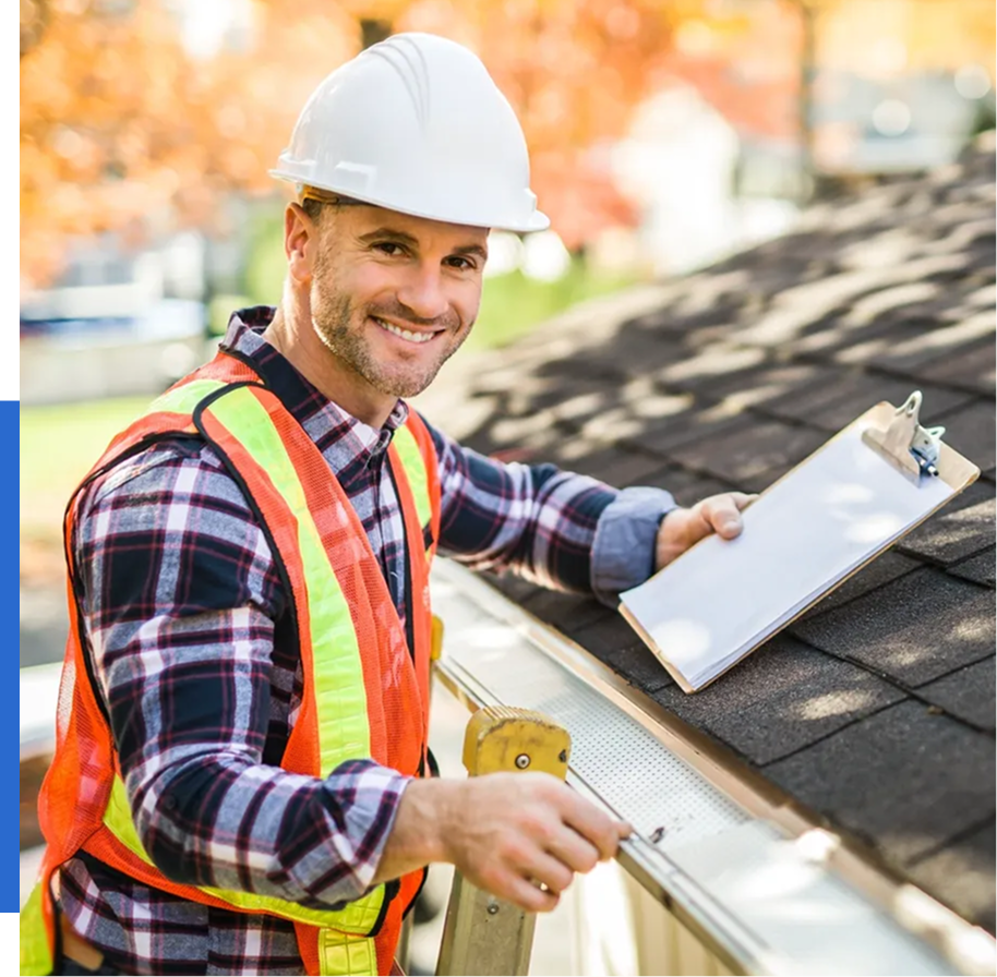 Group 71 (1) Construction worker inspecting roof with clipboard.