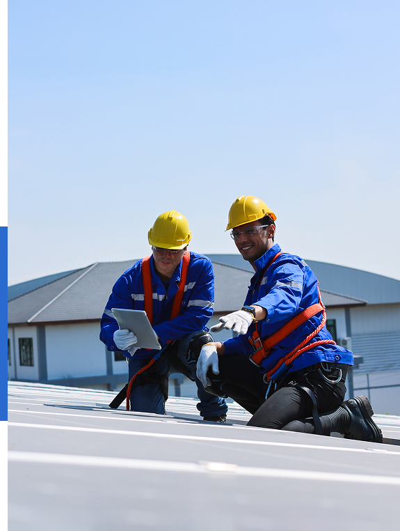 Group 72 (2) Two workers in safety gear on roof.